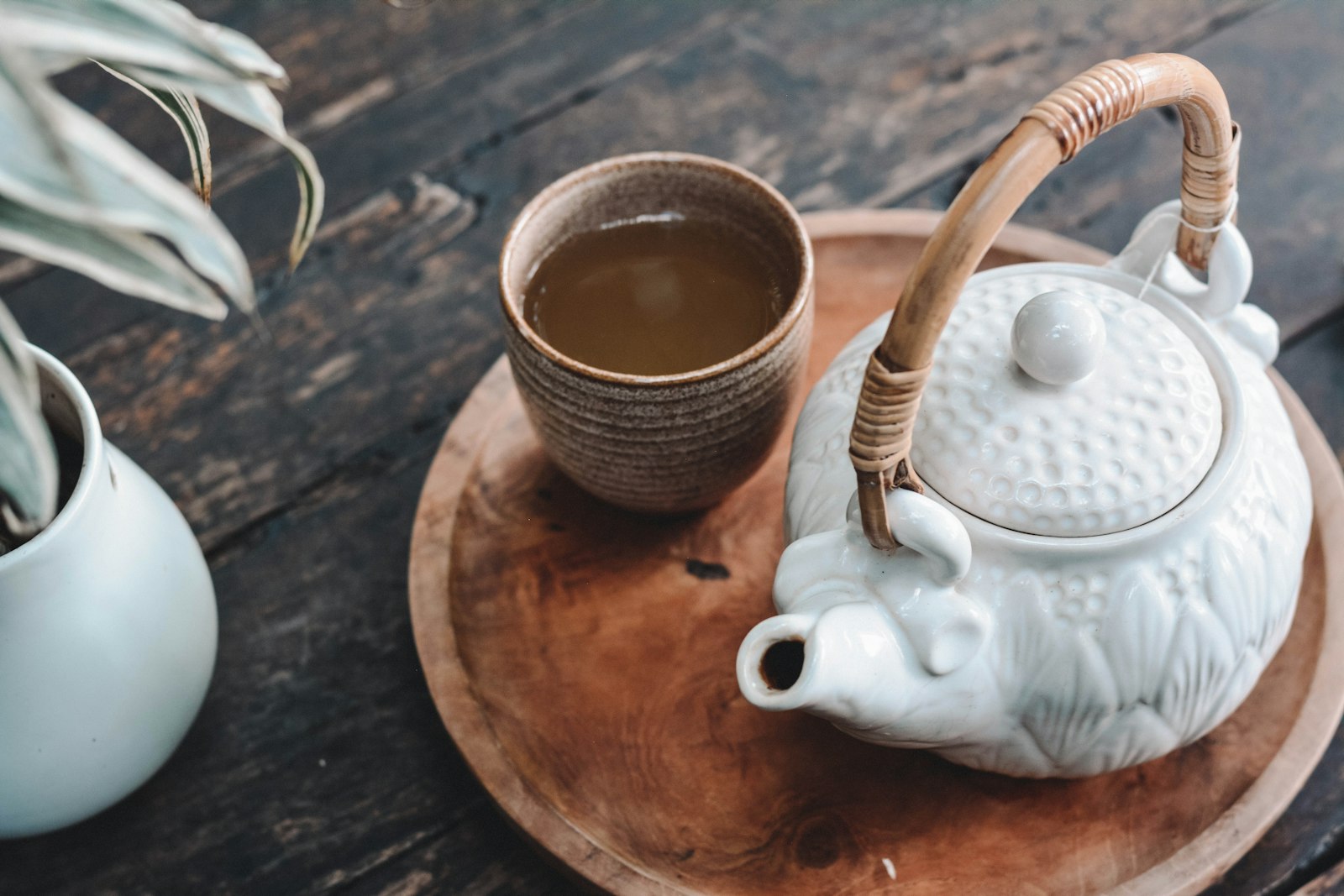 Bule e chávena de infusão